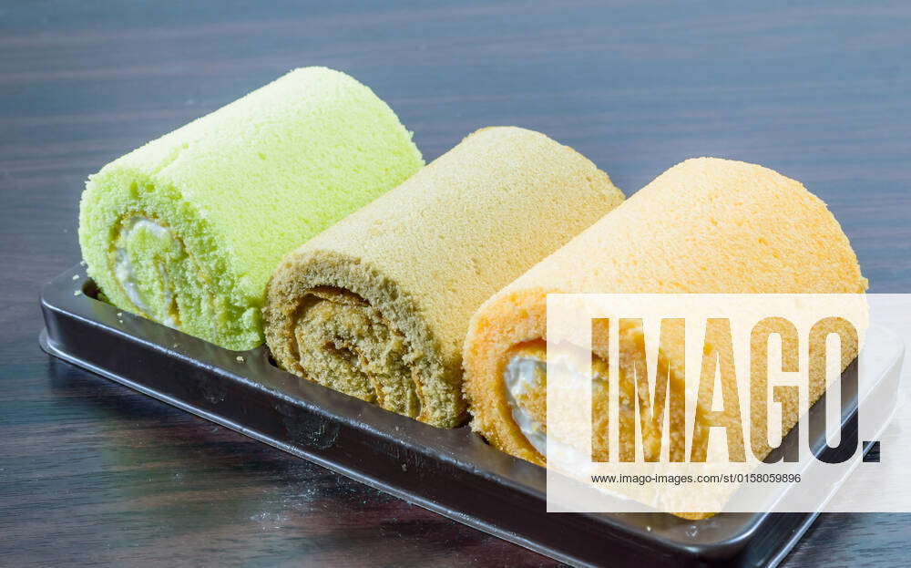 Jam Roll three pieces on the plastic tray. , 3244913, Baked, Jam Roll