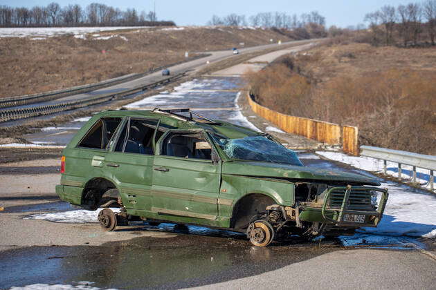 View of crashed Range Rover car in the highway. Broken car. Automobile ...
