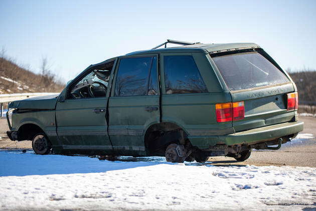 View of crashed Range Rover car in the highway. Broken car. Automobile ...