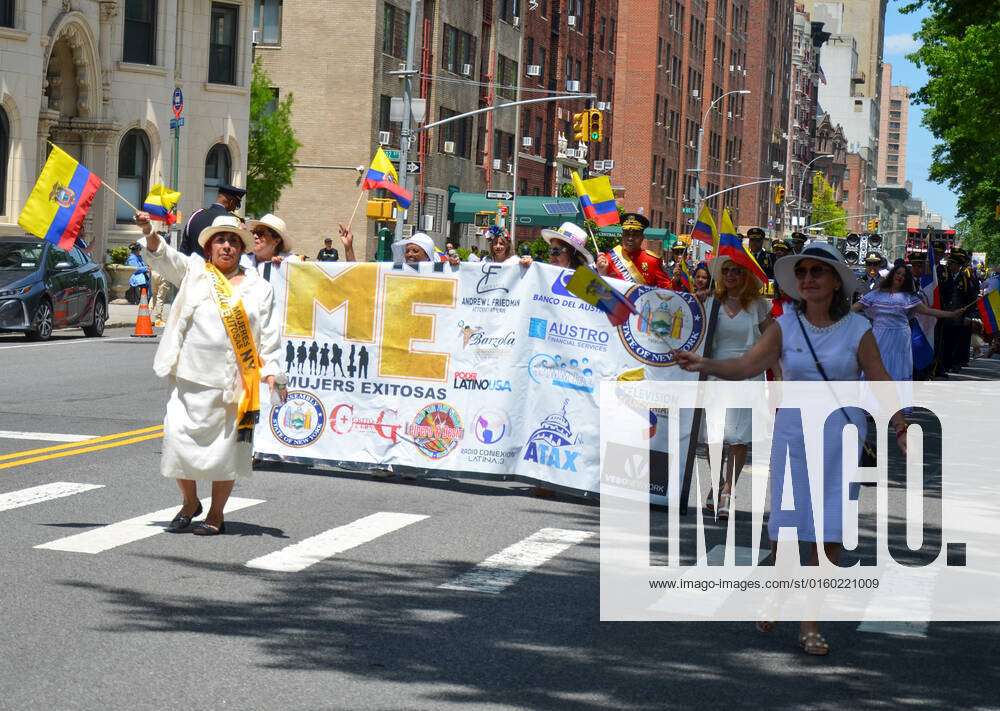 US Ecuadorian Parade in NYC Participants honding banner, march way up