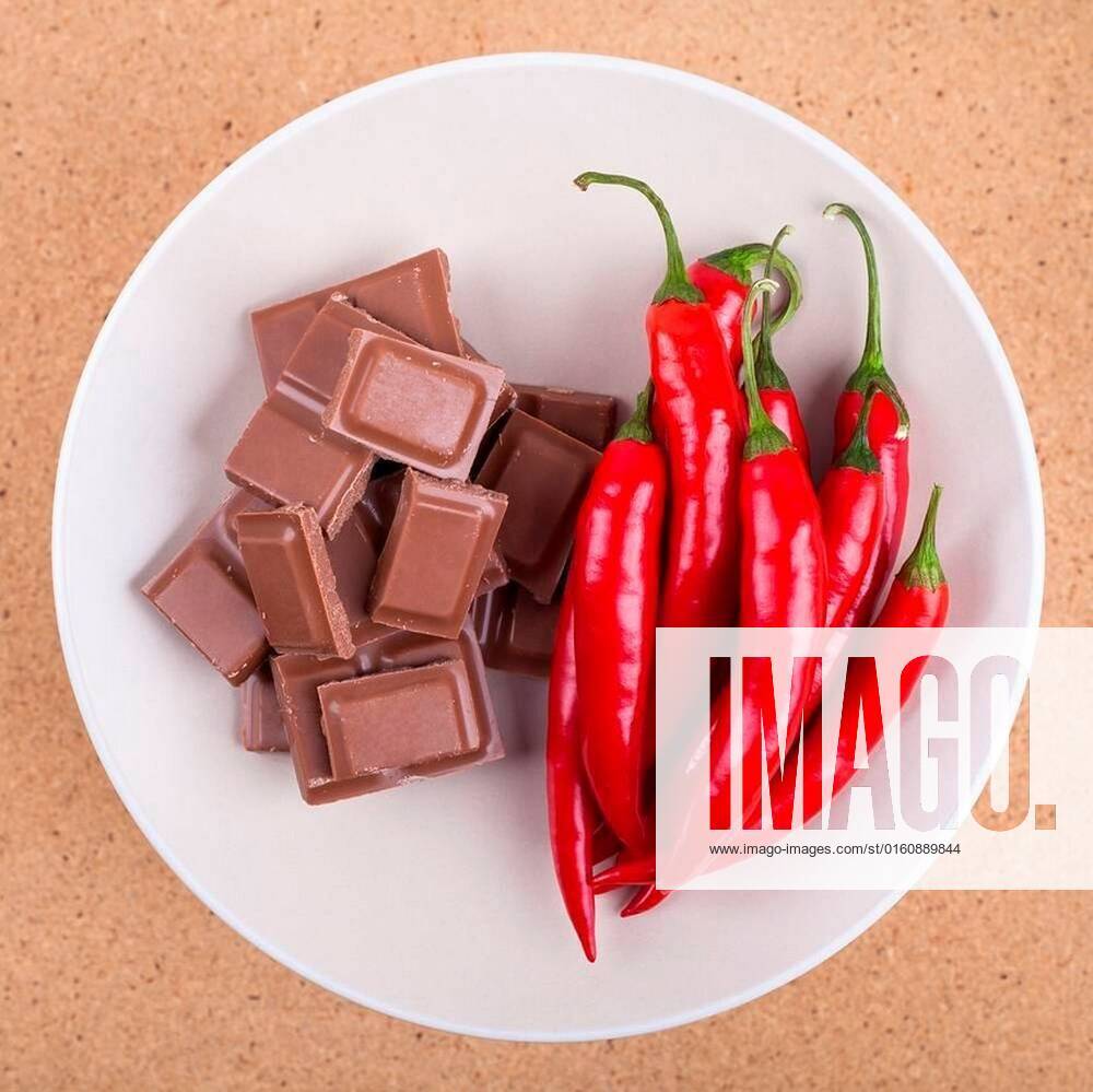 Fresh chili peppers and chocolate xFotosearchxLBRFx xCSP_JanMikax