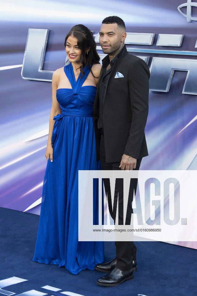 Lightyear Premiere London, UK. Jess Impiazzi and Jermaine Pennant at