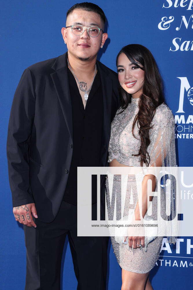 Los Angeles, USA. 16th June, 2022. (L-R) Julio Urías and Girlfriend at the  Los Angeles Dodgers Foundation 6th Annual Blue Diamond Gala held at the  Dodger Stadium in Los Angeles, CA on