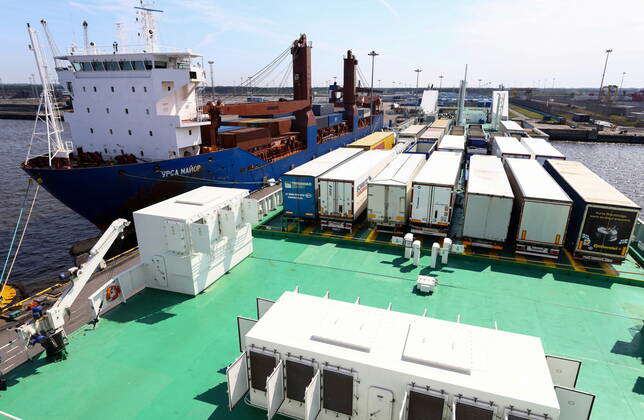 Ferry Ruskim LENINGRAD REGION, RUSSIA – : Unloading the Marshal Rokossovsky ferry at ...
