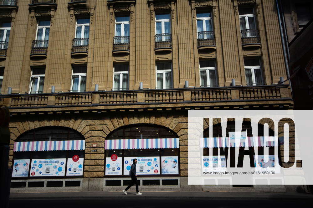 Germany Starts Charging For Covid 19 Test a man walks pass a