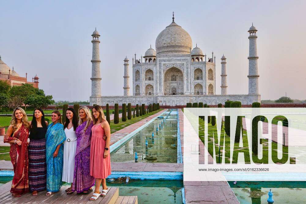 Indian girl poses in front of the Taj Mahal | There & Back