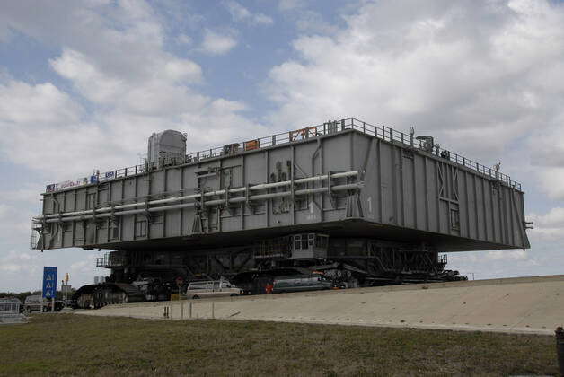 Nasa Mlp CAPE CANAVERAL, Fla. Mobile Launcher Platform-1 nears the top of Launch ...