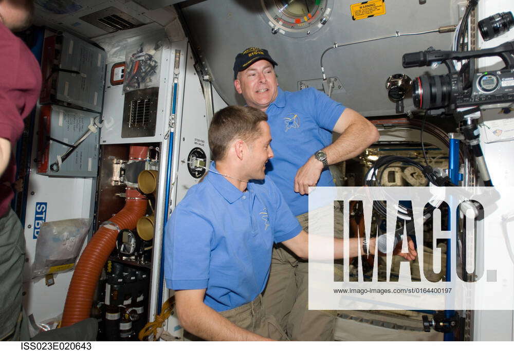 ISS023-E-020643 (7 April 2010) --- NASA astronauts James P. Dutton Jr ...