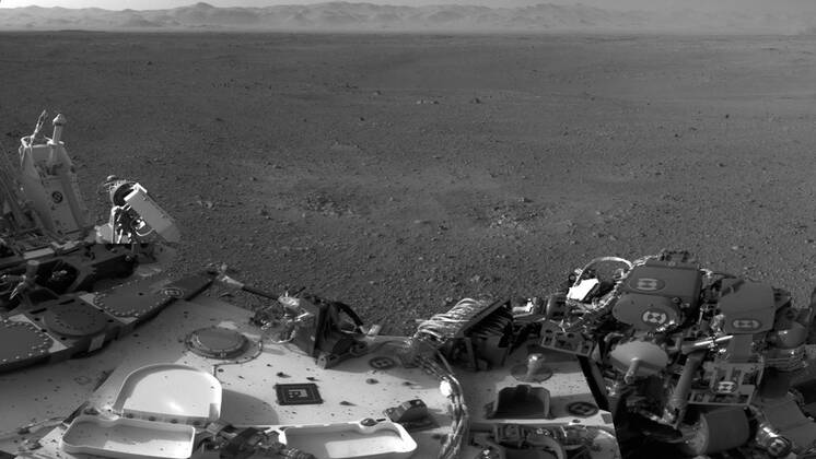 Descent In Rockets This mosaic image shows part of the left side of NASA s Curiosity rover ...