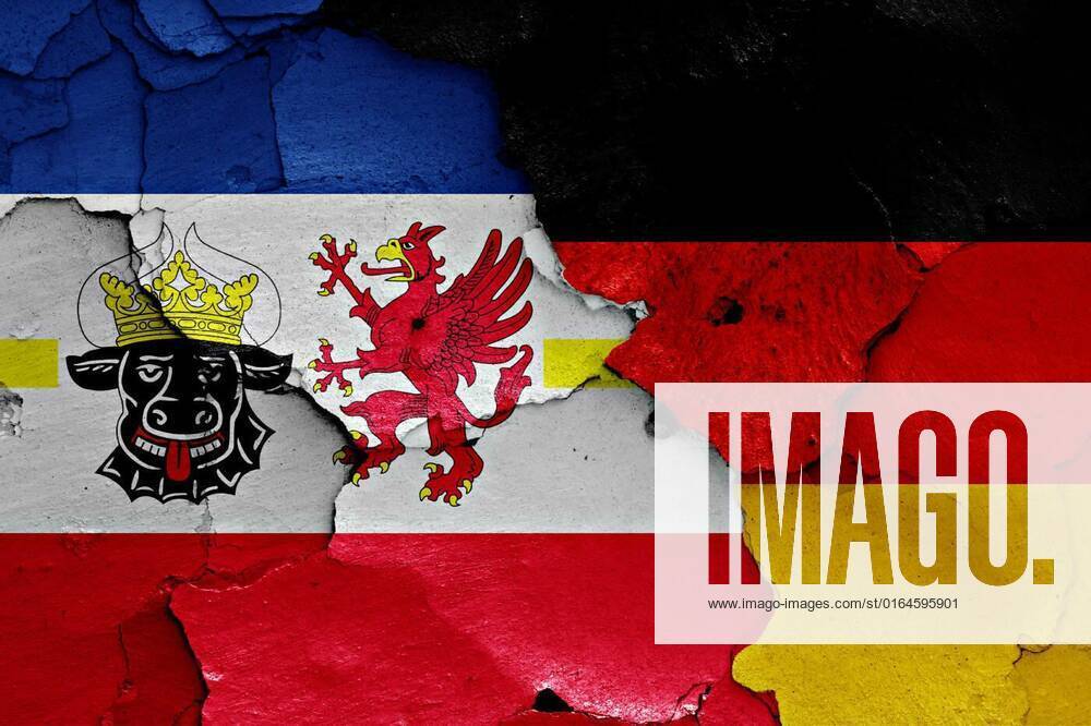 Flags of Mecklenburg Vorpommern and Germany painted on cracked wall