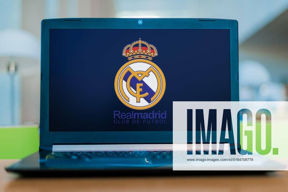 Laptop Computer Displaying Logo Of Real Madrid Poznan Pol Jul 11