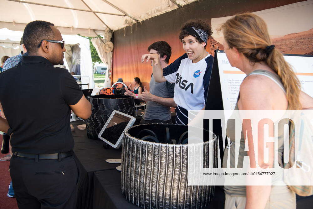 Visitors learn about rover tires at the Apollo 11 50th Anniversary ...
