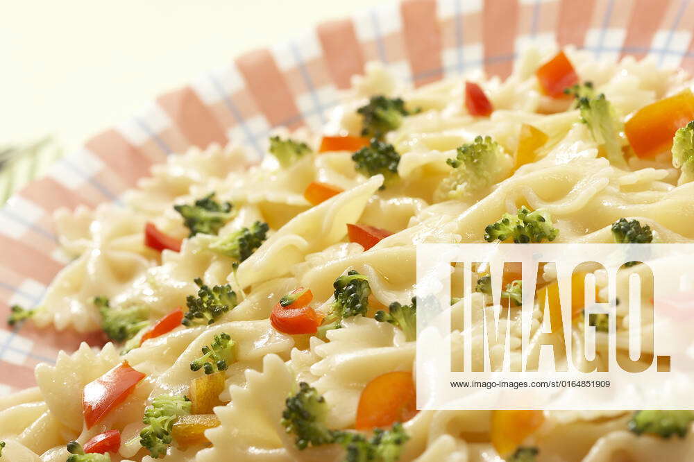 Macro picture of appetizing cooked pasta with vegetables