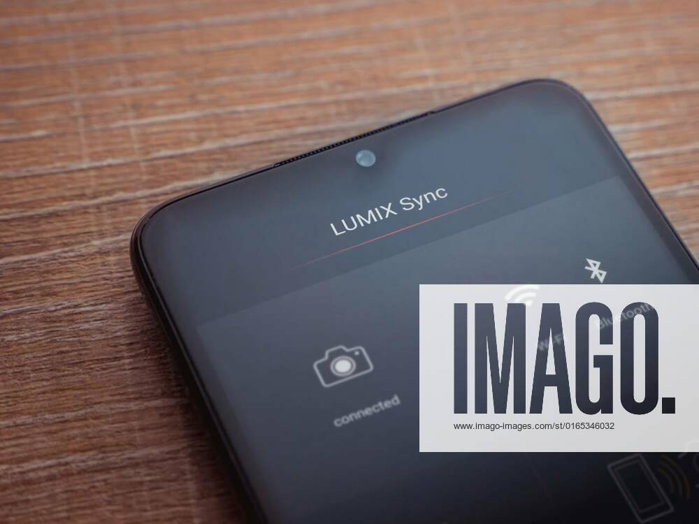 Panasonic LUMIX Sync app launch screen with logo on the display of a