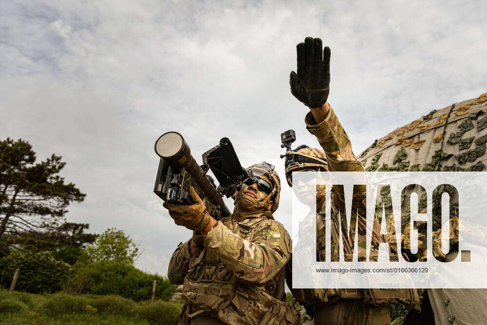 Sgt. Zane Pettibone and Spc. Svenson Albert, a Stinger Man-Portable Air ...