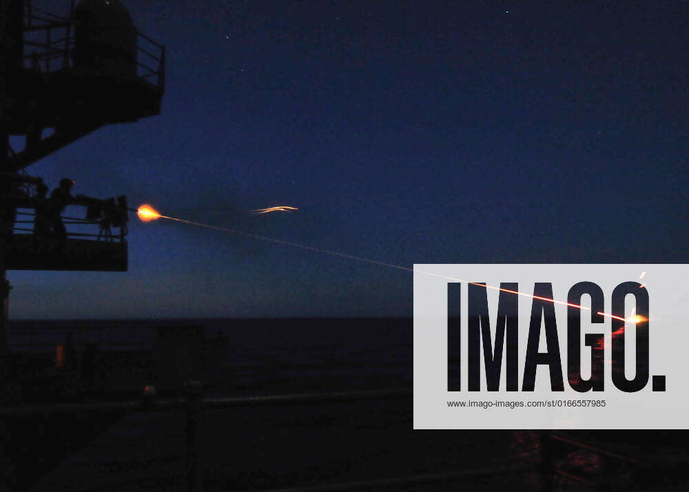 PACIFIC OCEAN (April 8, 2014) A weapons department Sailor fires a .50