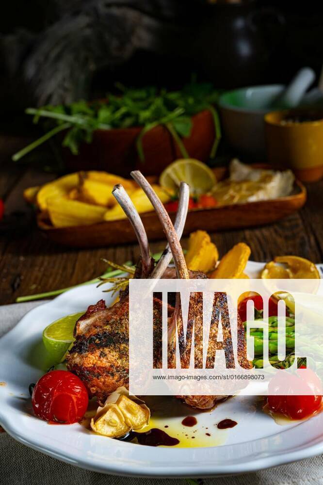 Lamb chops marinated in herbs with green asparagus and lime, Lamb chops