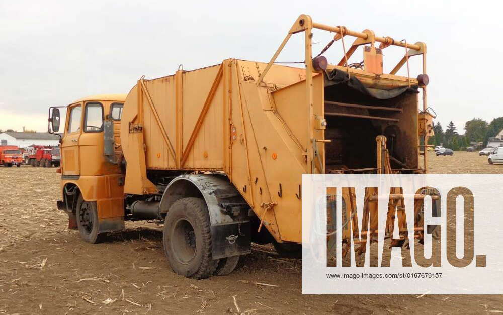 GDR garbage truck orange W50 rear view., GDR garbage truck W50 rear