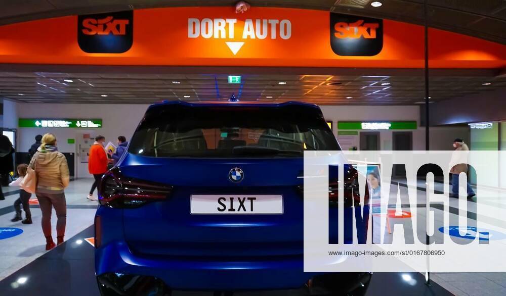 Dortmund, Germany December 28, 2021 Sixt car rental employee waits