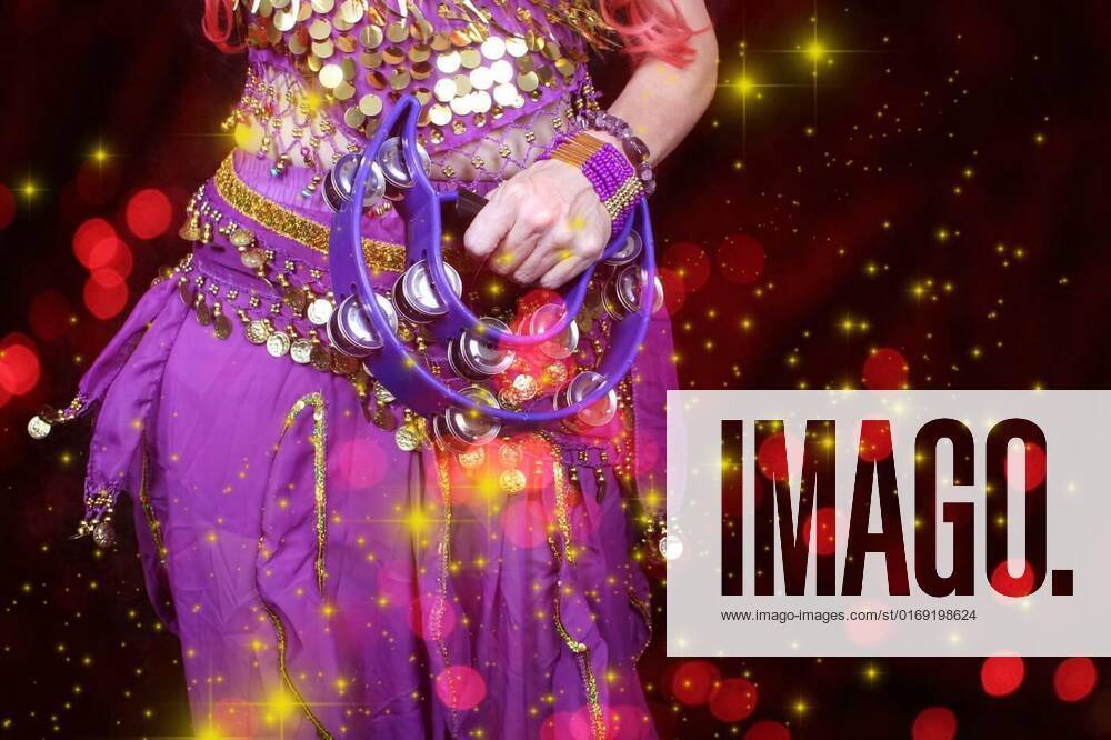 Belly Dancer Wearing Purple Dance Costume Close Up With Bokeh Belly Dancer Wearing Purple Dance 1139