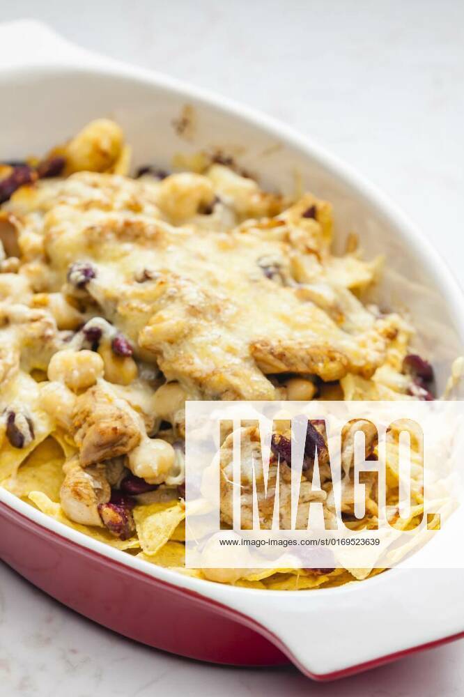 Nachos with chicken meat, red beans and cheese, nachos with chicken