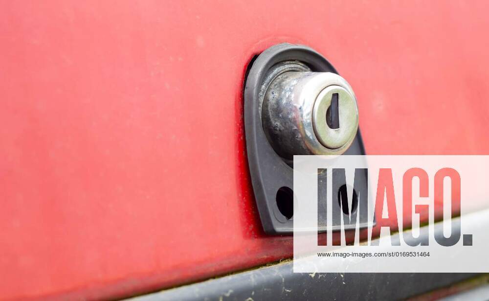Old car trunk lock. Trunk lock details. Closeup of a handle to open