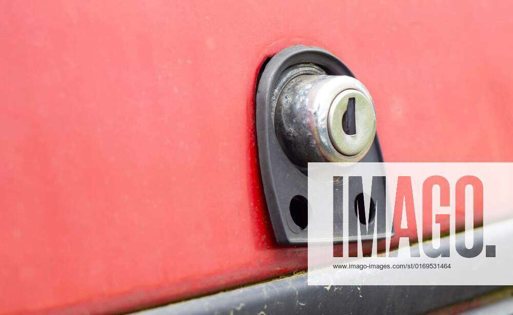 Old car trunk lock. Trunk lock details. Closeup of a handle to open