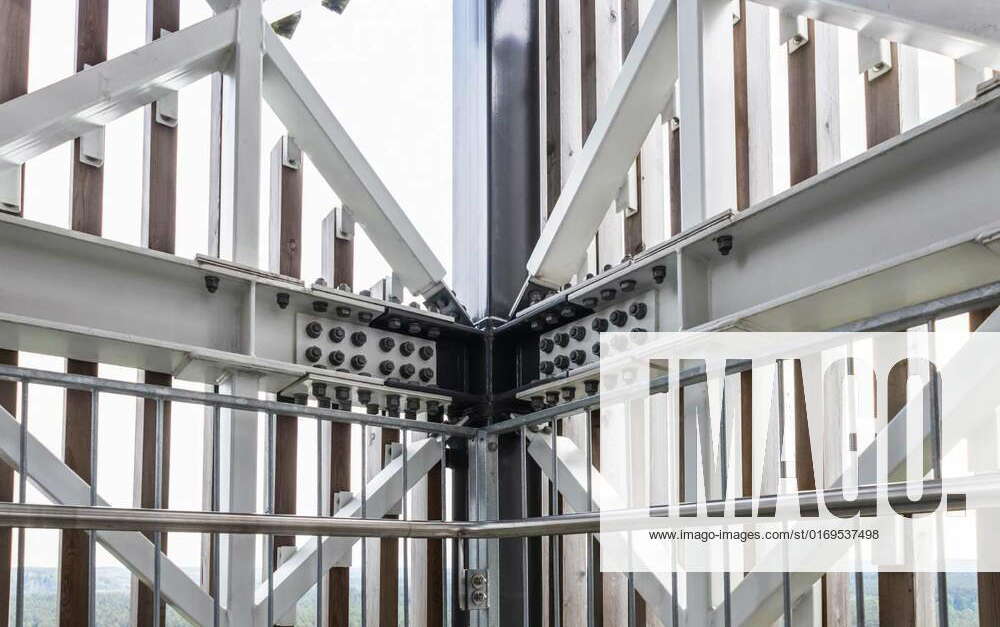 Massive industrial steel construction endtoend with bolts and nuts on