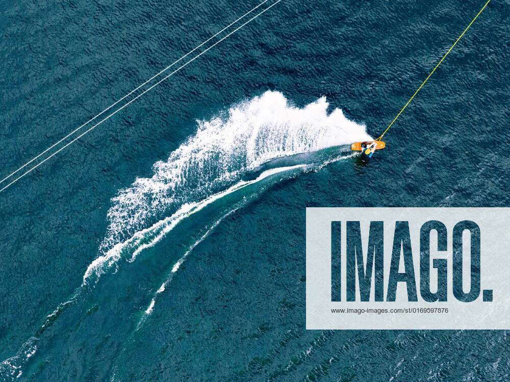 Top view of a wakeboard rider in wake cable park, Aerial wakeboarding