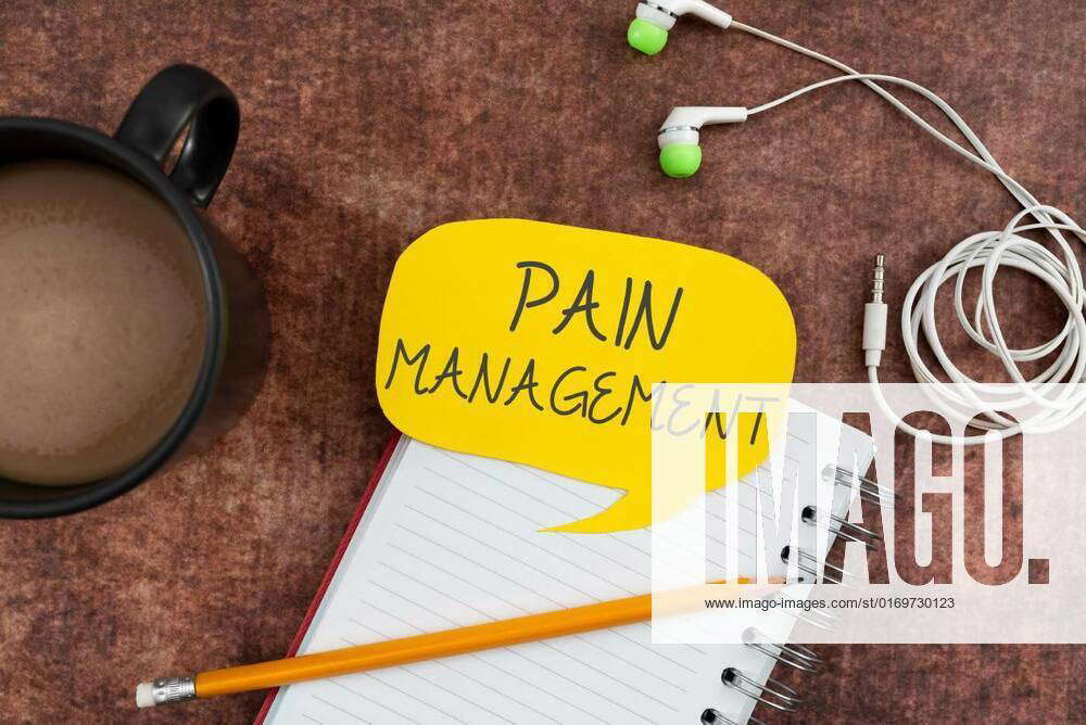 Hand writing sign Pain Managementa branch of medicine employing an