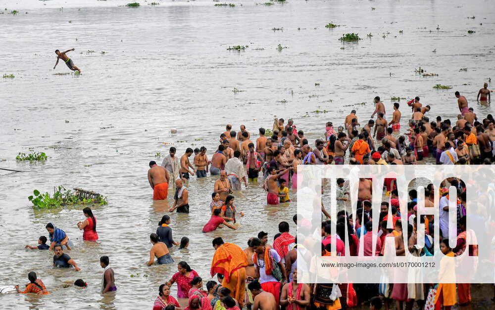 September 25, 2022, Kolkata, India: Devotees seen in River Ganges ...