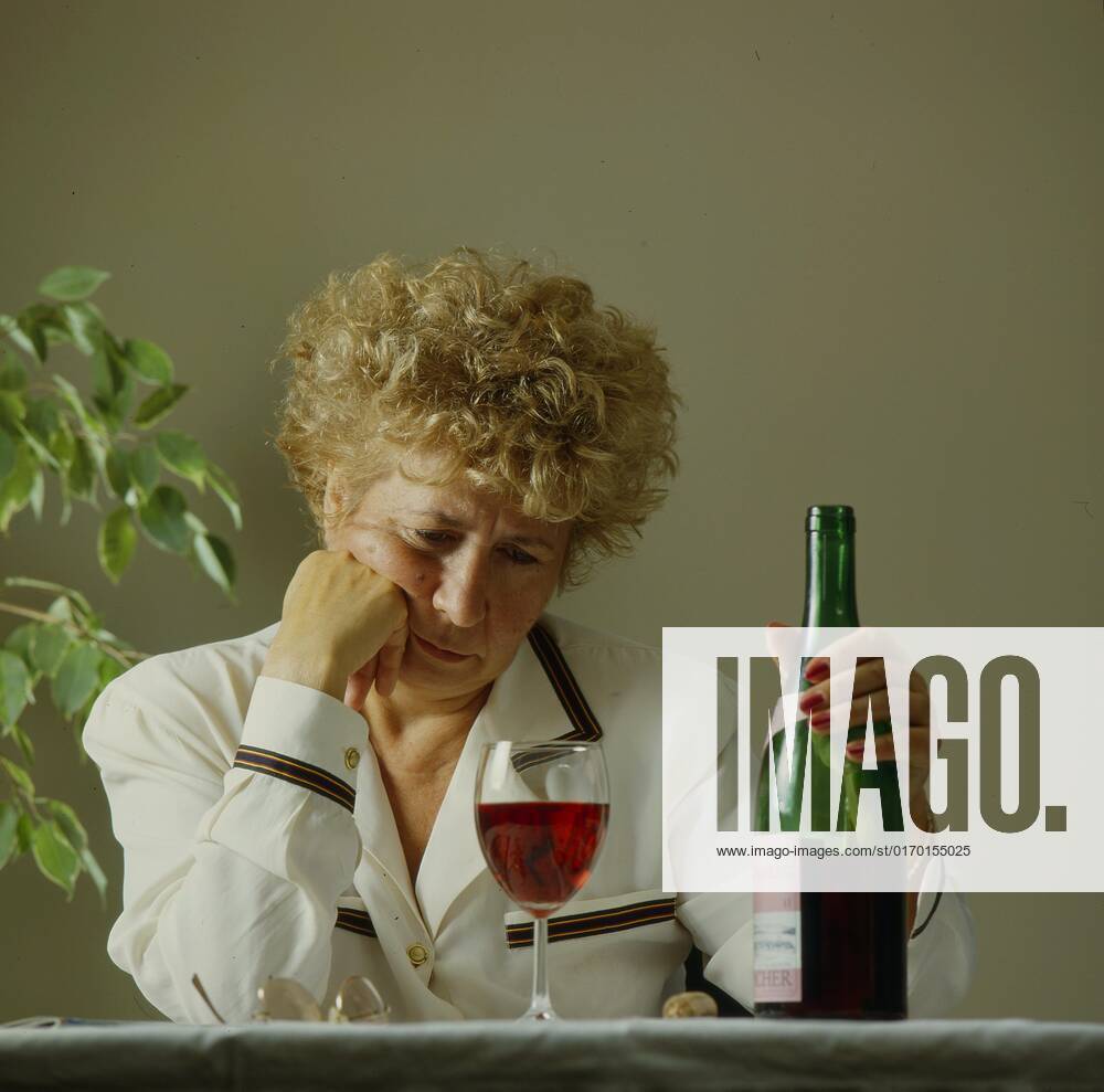 older Woman with Wine glass and Bottle