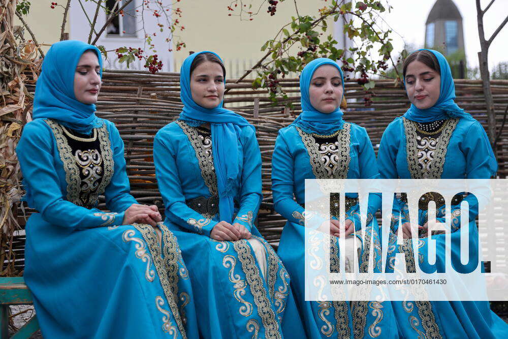 GROZNY, RUSSIA - OCTOBER 5, 2022: Women in national dress attend a City ...