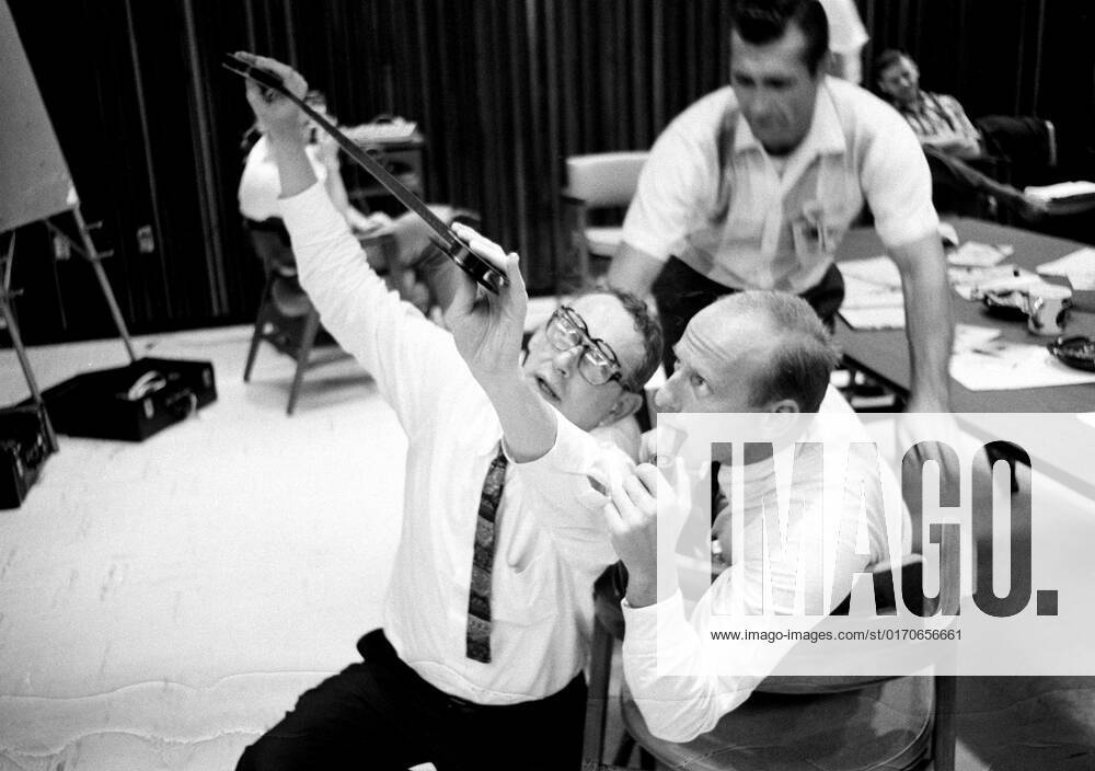 (23 Sept. 1966) --- Astronauts Charles Conrad Jr. (with pipe) and ...