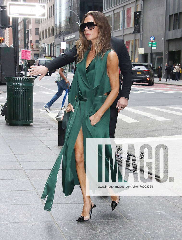 Victoria Beckham In A Green Dress At BCBGMAXAZRIA Featuring