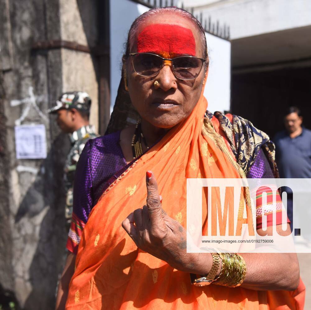 mumbai-india-november-3-a-voter-shows-her-ink-marked-finger-at-a