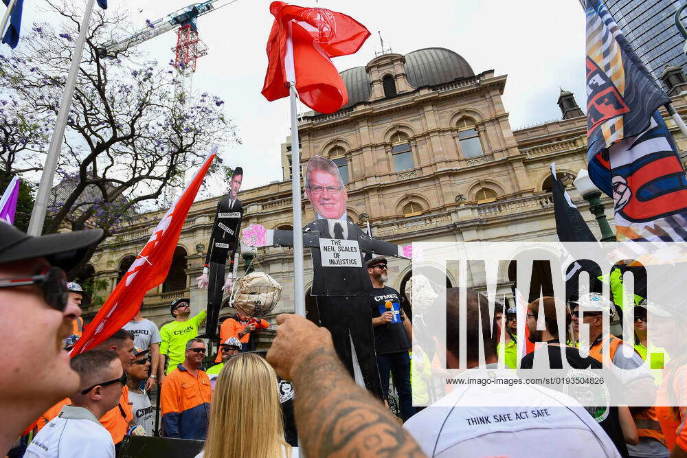 QLD CFMEU WAGES POLICY RALLY, Union workers stand outside Queensland
