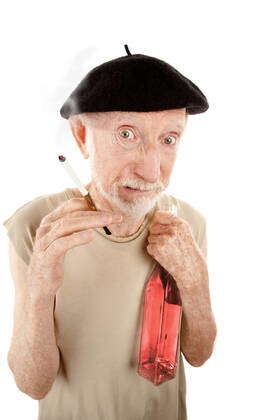 Ragged senior man with liquor bottle and cigarette