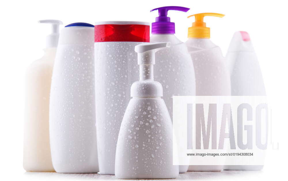 Plastic contaiers of shampoos and shower gels isolated on white ...