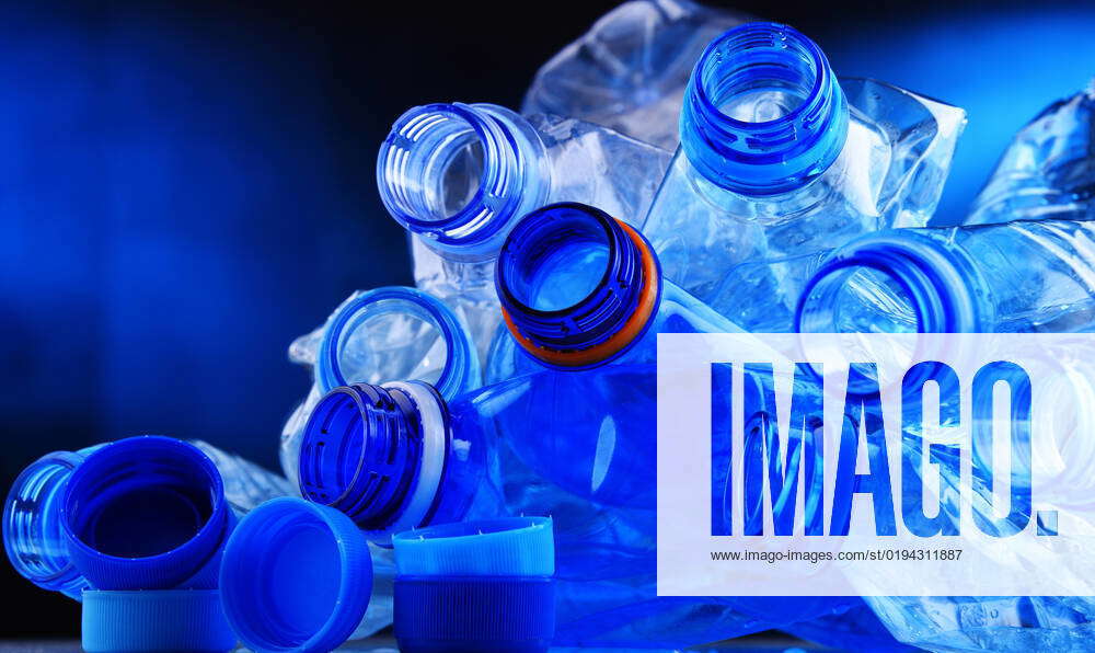 Composition with empty mineral water bottles. Plastic waste Composition