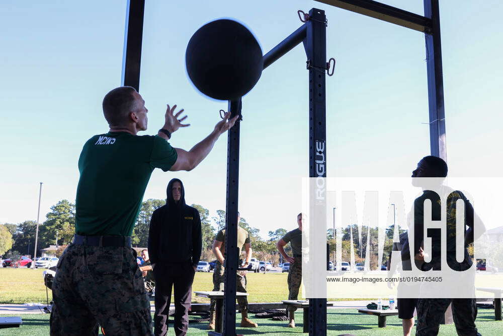 U.S. Marine Corps Staff Sgt. James W. Norris, left, Marine Corps Water ...