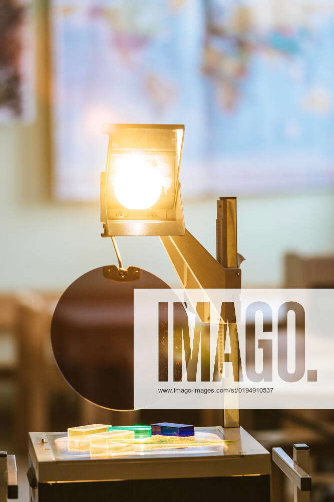 Schooling concept Retro overhead projector in classroom, educational system Vintage overhead