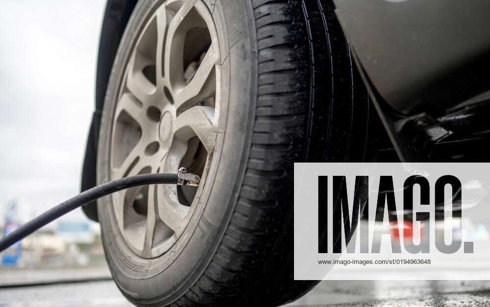 Car tire inflated through air pump