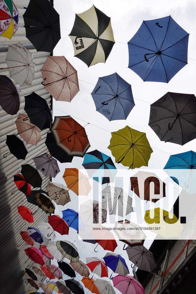 19 05 2022, Zuerich, Canton Zuerich, CHE umbrellas hanging on lines in