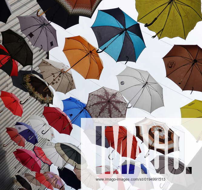 19 05 2022, Zuerich, Canton Zuerich, CHE umbrellas hanging on lines in