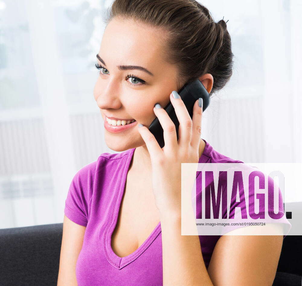 Attractive Young Brunette Woman Calling By Her Mobile Phone Model attractive-young-brunette-woman-calling-by-her-mobile-phone-model