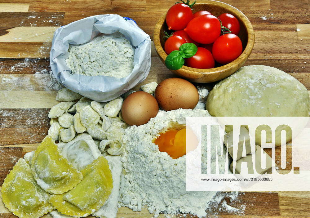 Ingredients for preparation of homemade egg pasta flour, eggs
