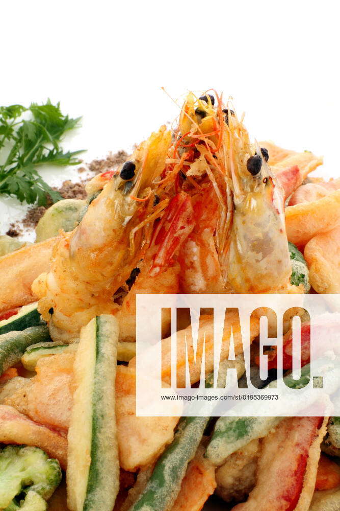 Japanese fried tempura with shrimp and vegetables with parsley garnish