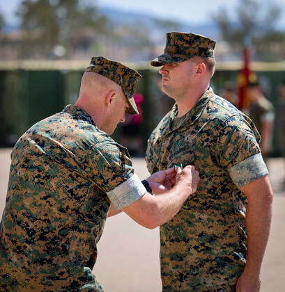 U.S. Marine Corps Gunnery Sgt. Colin G. Baird, a geospatial analyst ...