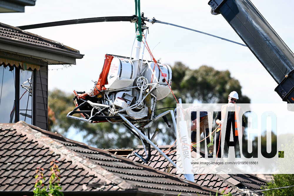 HELICOPTER CRASH MELBOURNE, Emergency services remove the wreckage of a